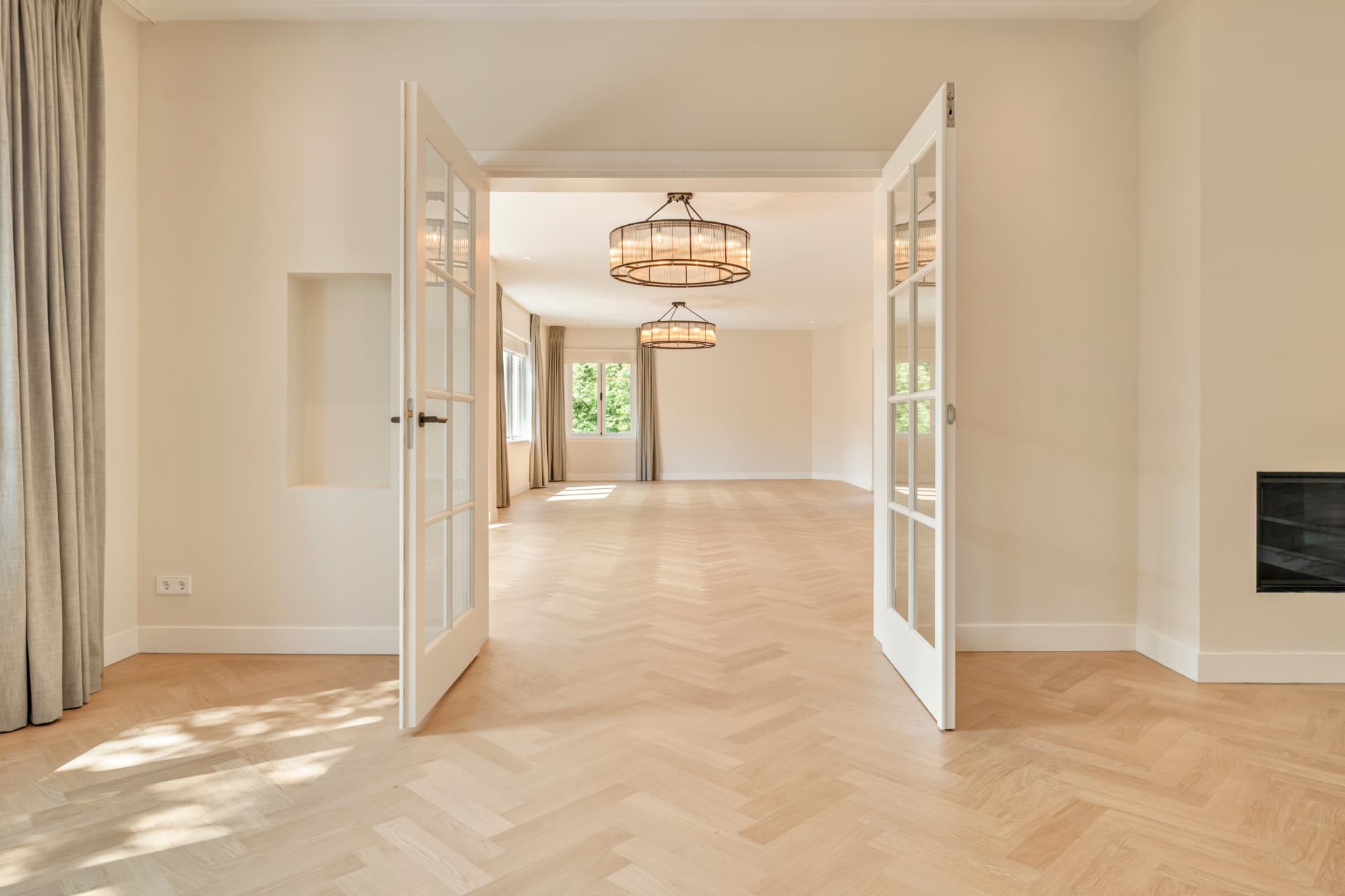 En suite rooms with double doors and herringbone floor