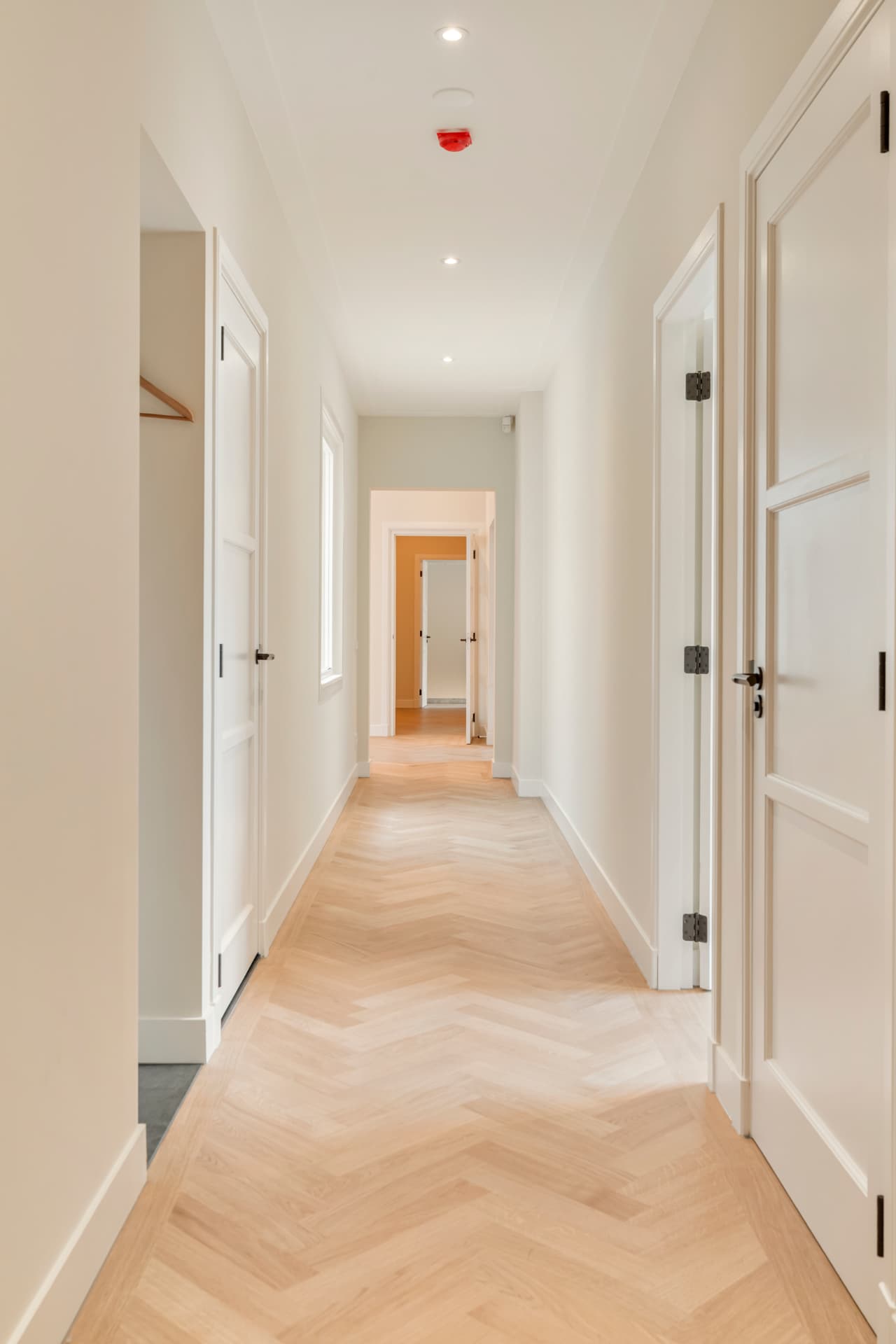 Hallway with herringbone floor